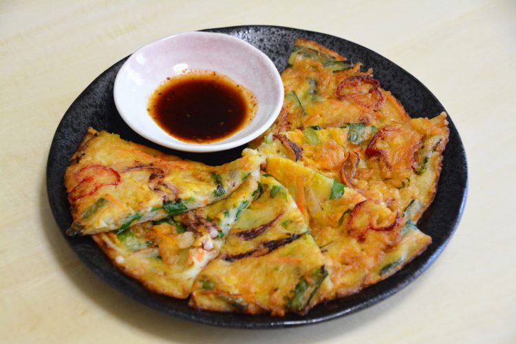 Which one is monjayaki, a local dish of Tokyo?